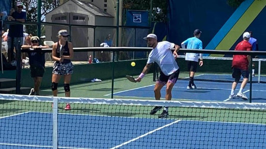 Tyson McGuffin and Anna Leigh Waters playing mixed doubles pickleball - winners and improved competition